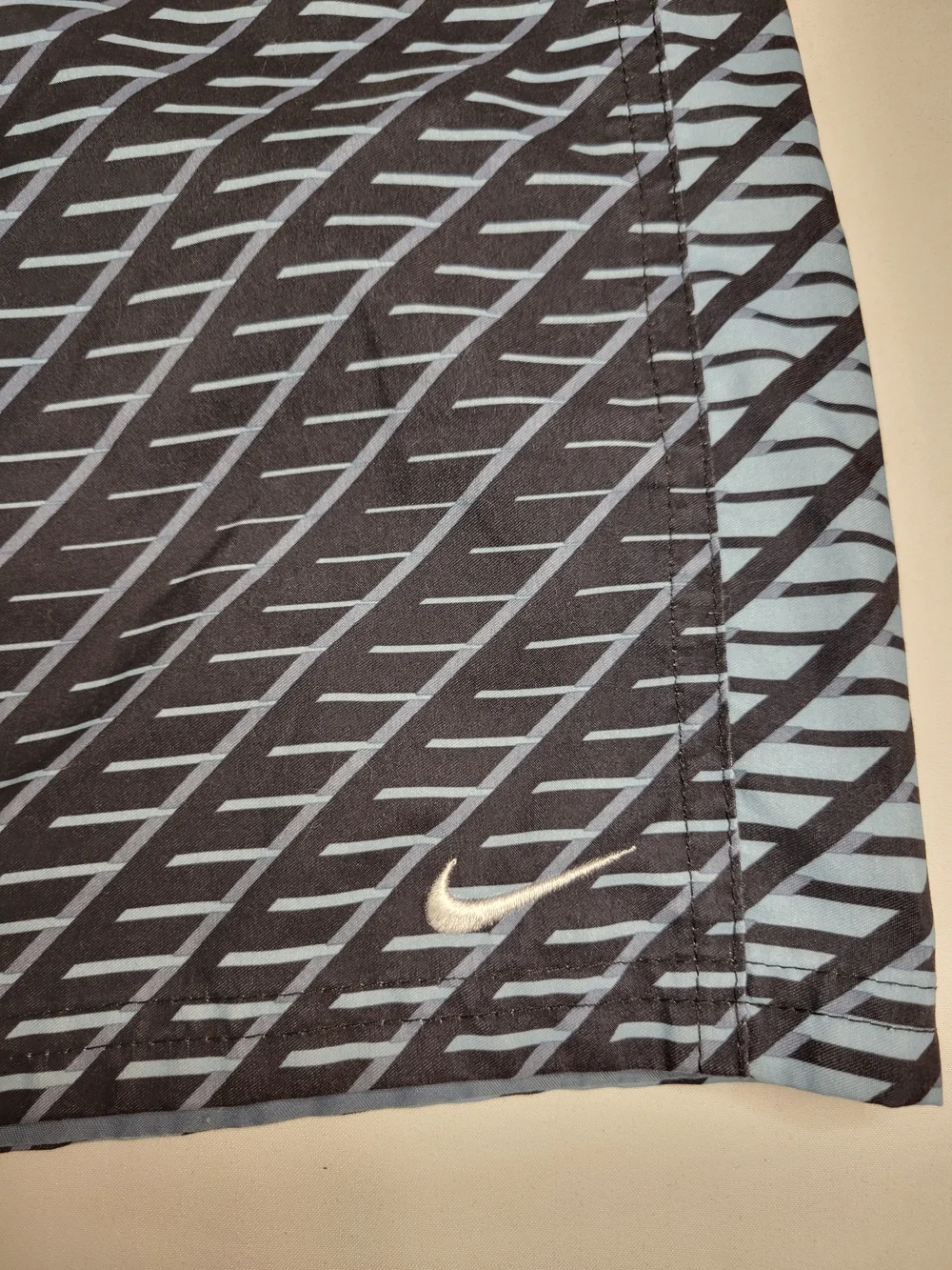 Nike Men's Blue and Black Diagonal Stripe Swim Trunks